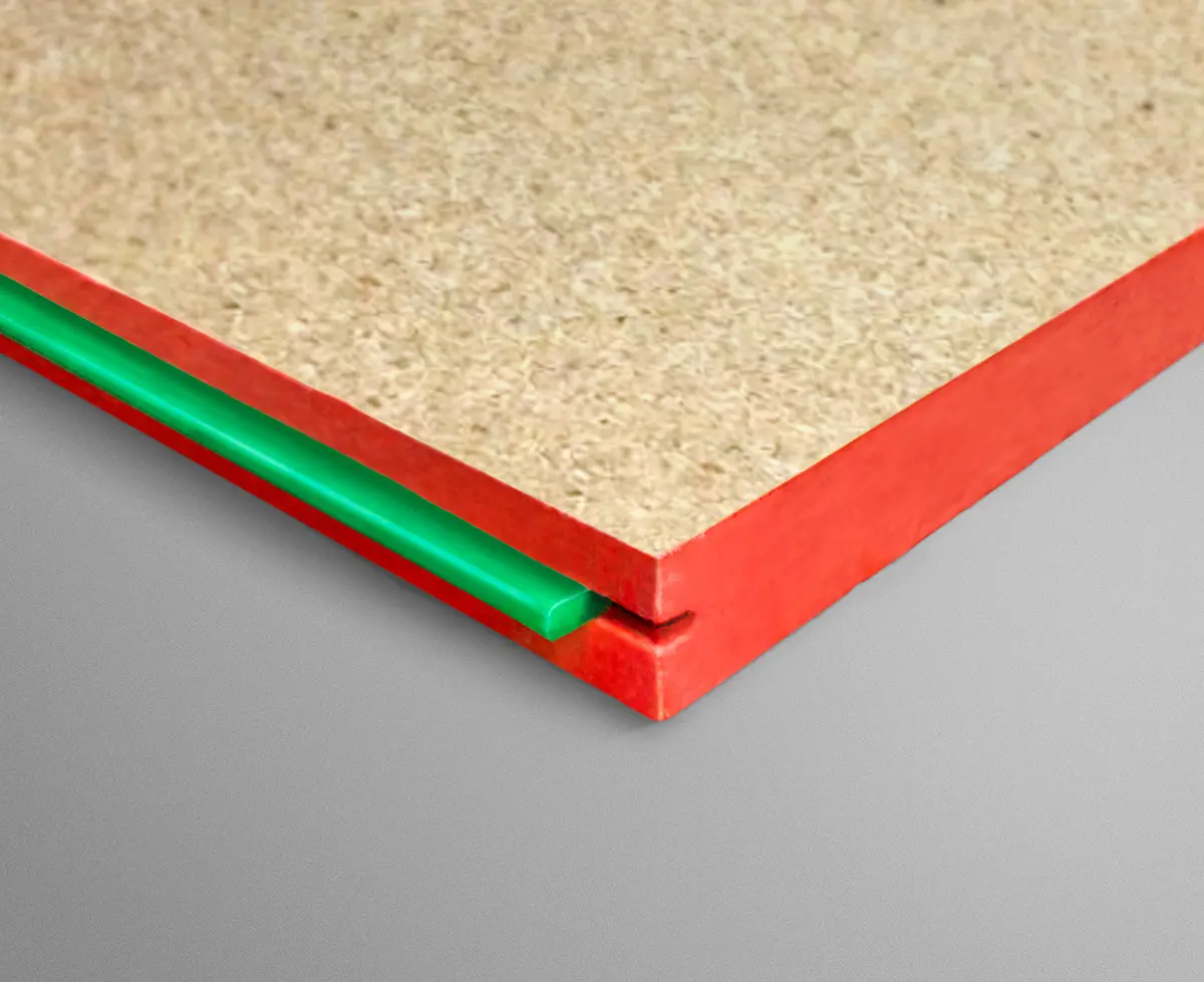Close-up of a red-edged plywood panel with a green spacer between the edges.