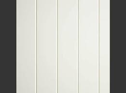 White vertical paneled wall or cabinet doors with slim grooves, resembling a paneled interior paneling