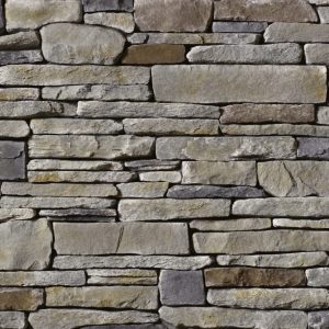 Dry-stone wall made of horizontally laid, irregular gray stones.
